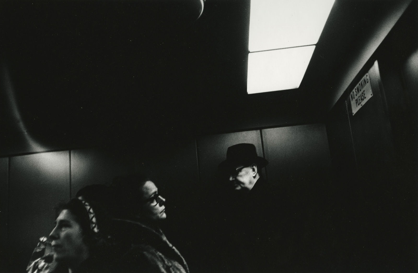 Larry Siegel, Three people in elevator, 1957