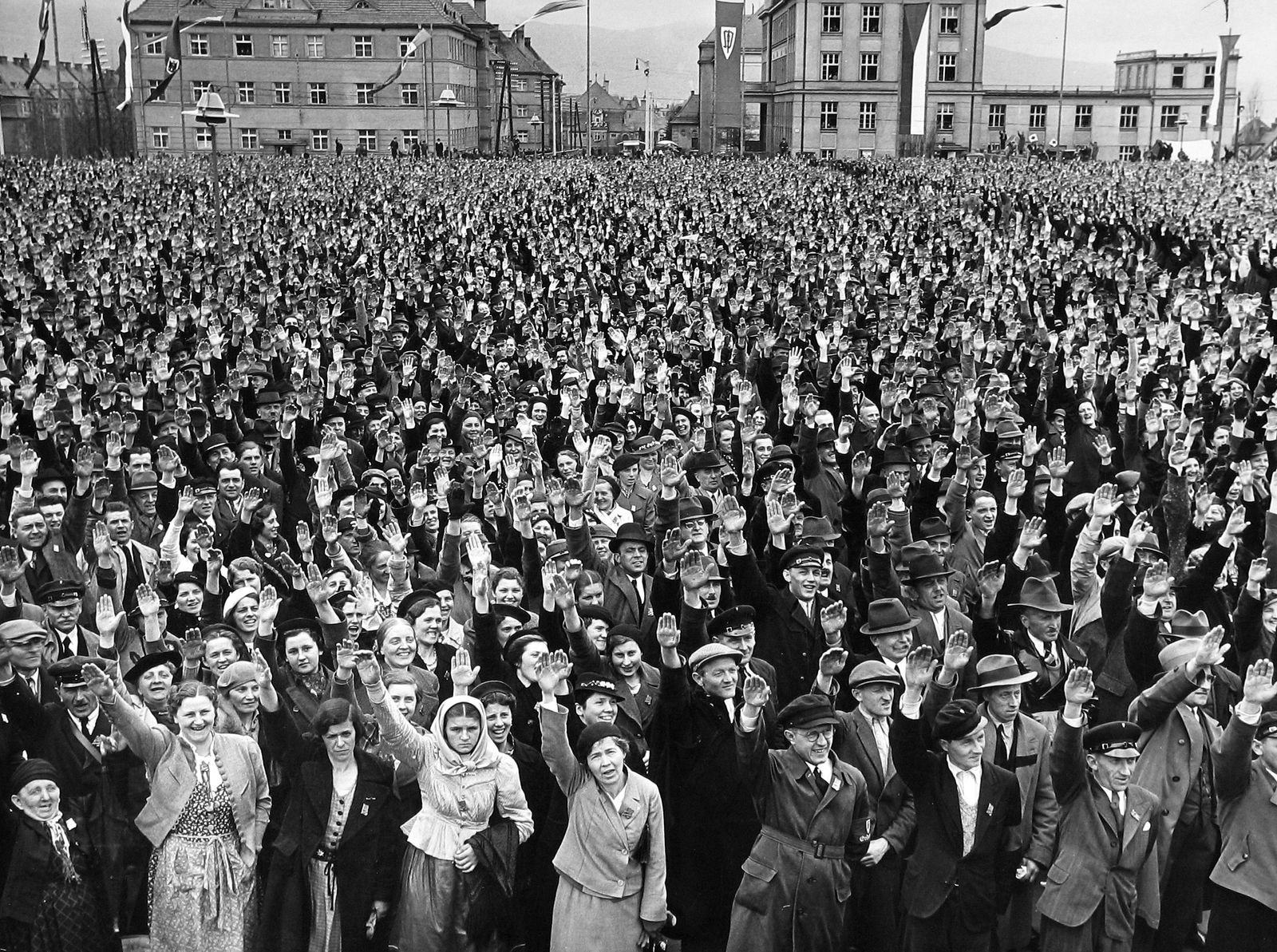 Margaret Bourke-White, A crowd of 40,000 responds to a fiery speech given by Czech Nazi leader Konrad Henlein with Nazi salute, 1938