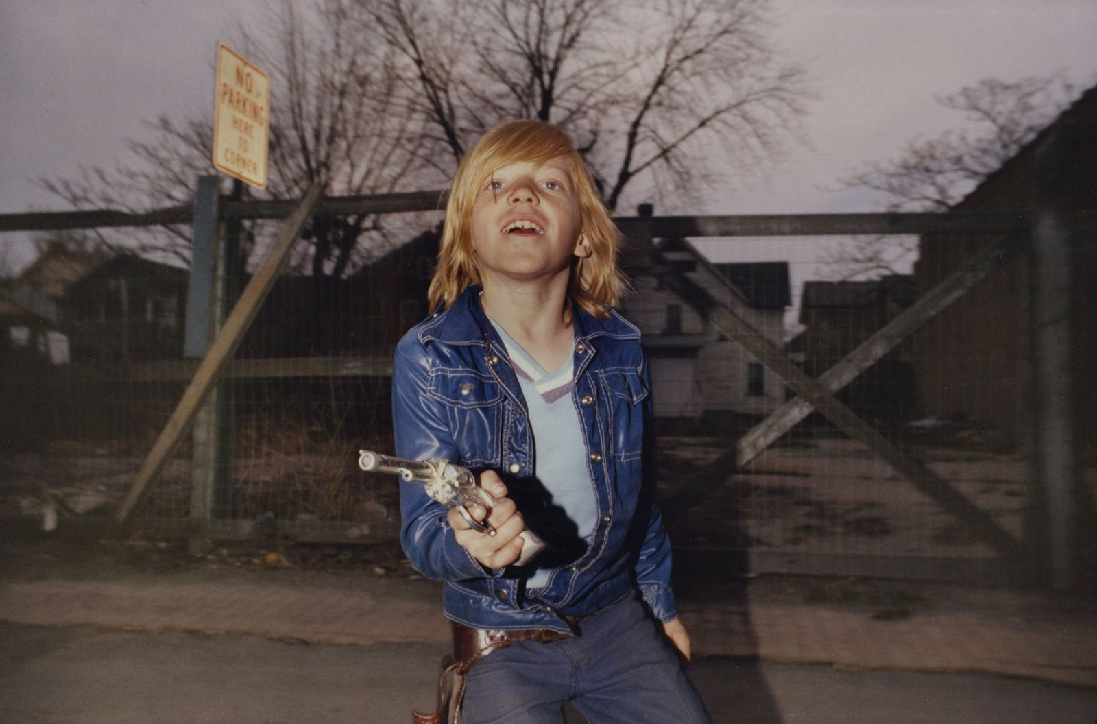 Mark Cohen Flashed Boy in Jacket with Six Shooter, 1974 Chromogenic print; printed later 8 x 10 inches