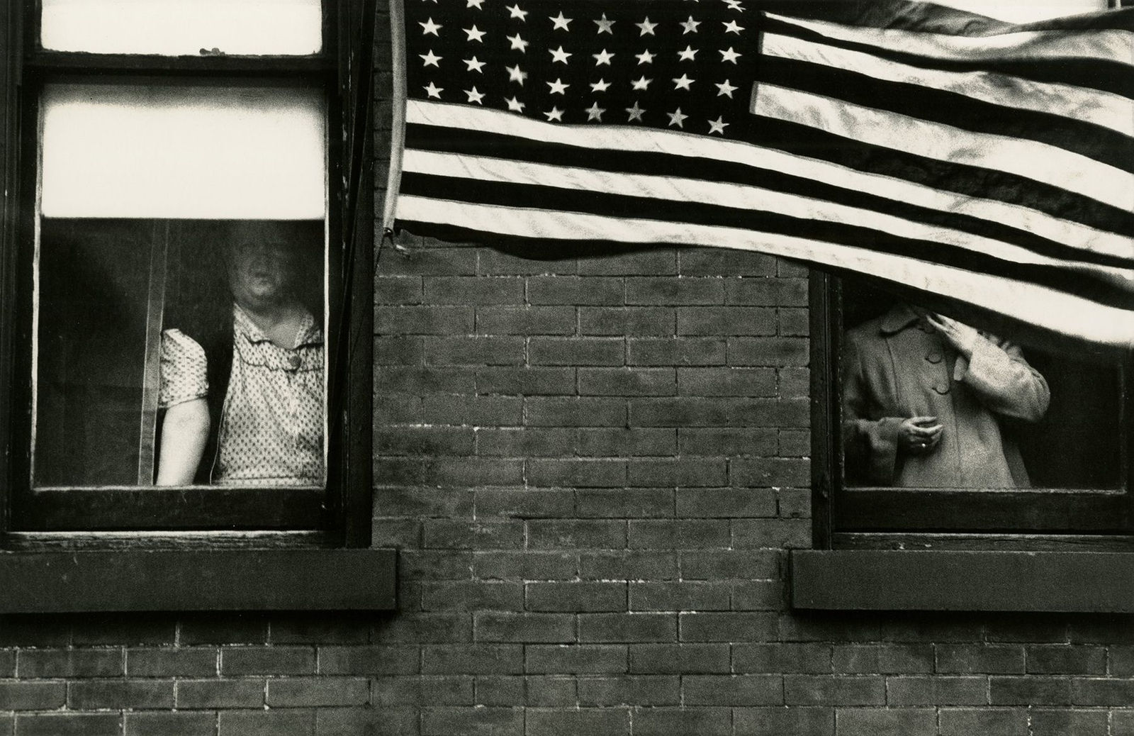 Robert Frank Parade, Hoboken, 1955 Gelatin silver print; printed 1970s 8 7/8 x 13 1/2 inches