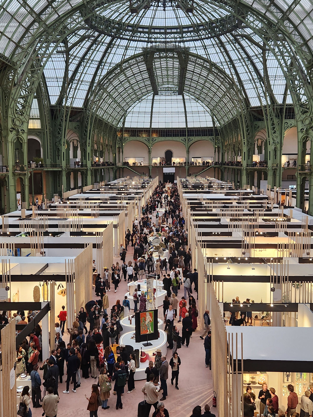 The bustling show floor at Révélations International Biennale of Fine Craft & Creation.