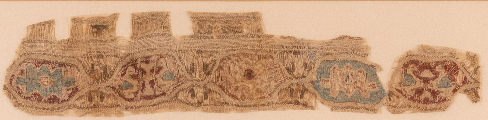 Egyptian, A collection of three rare Coptic tetxile fragments, 4th to 11th century