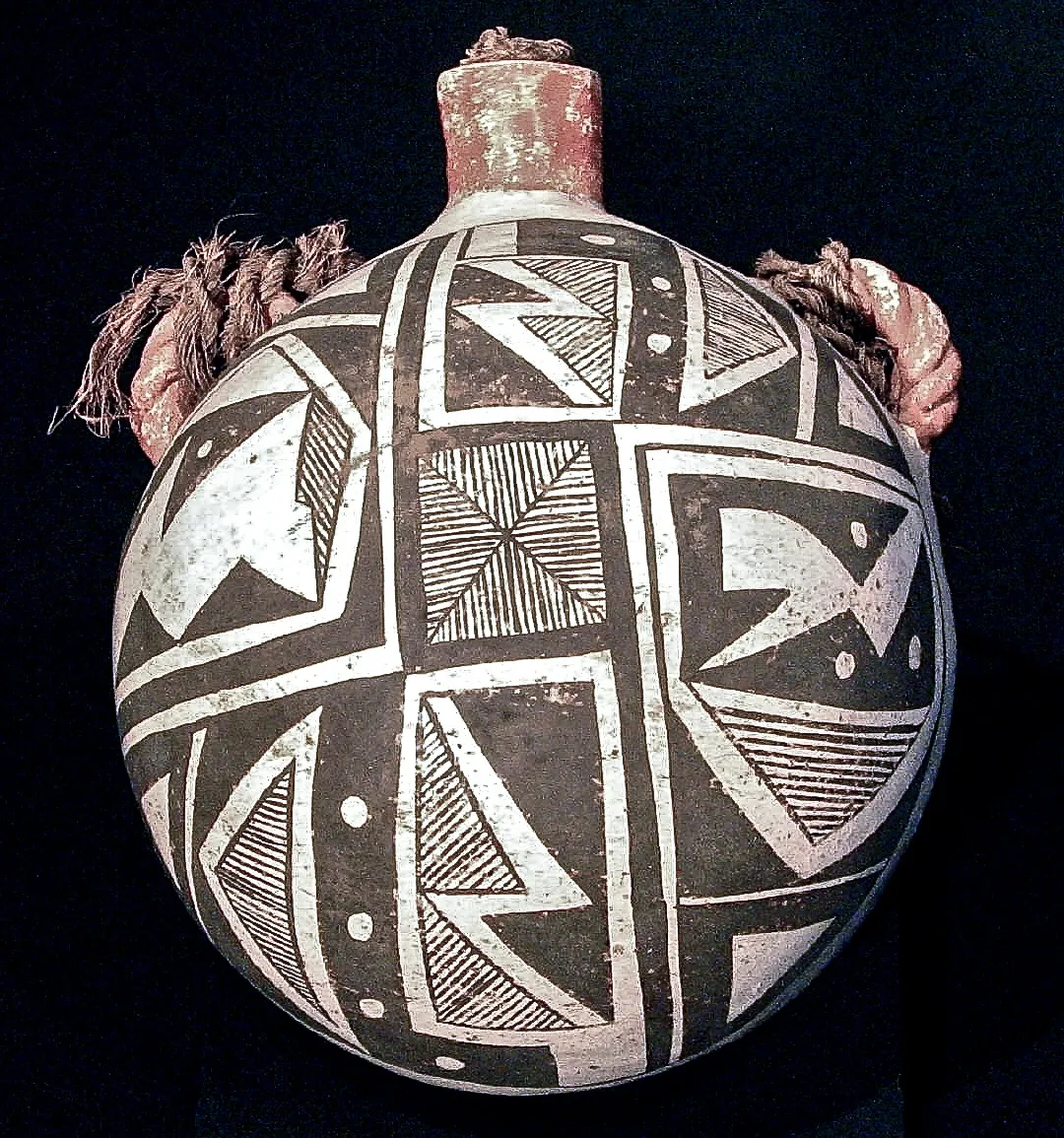 Acoma Pottery Canteen with intact twined cordage., c. 1900