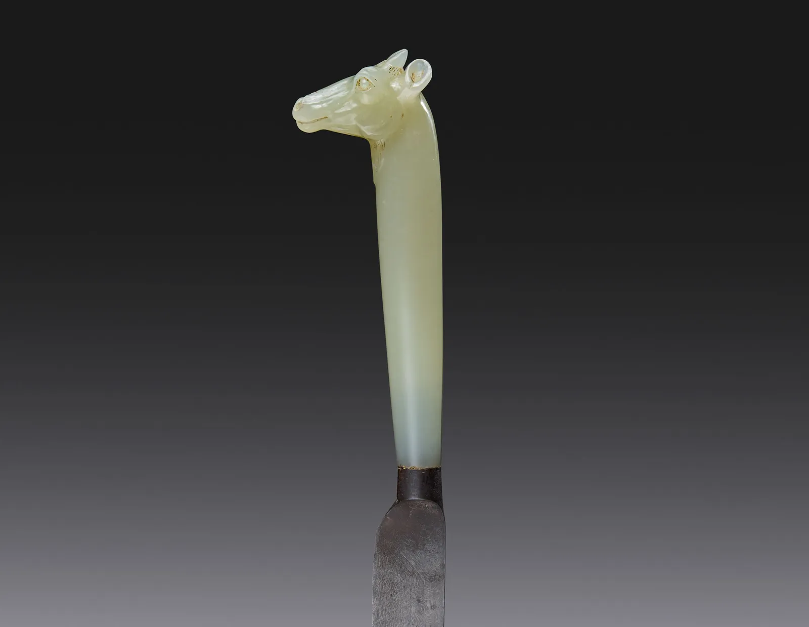 A jade handled knife Mughal, Northern India, c. 1675-1725 Jade and steel Length overall 25.5 cm, length of jade hilt 9.3 cm