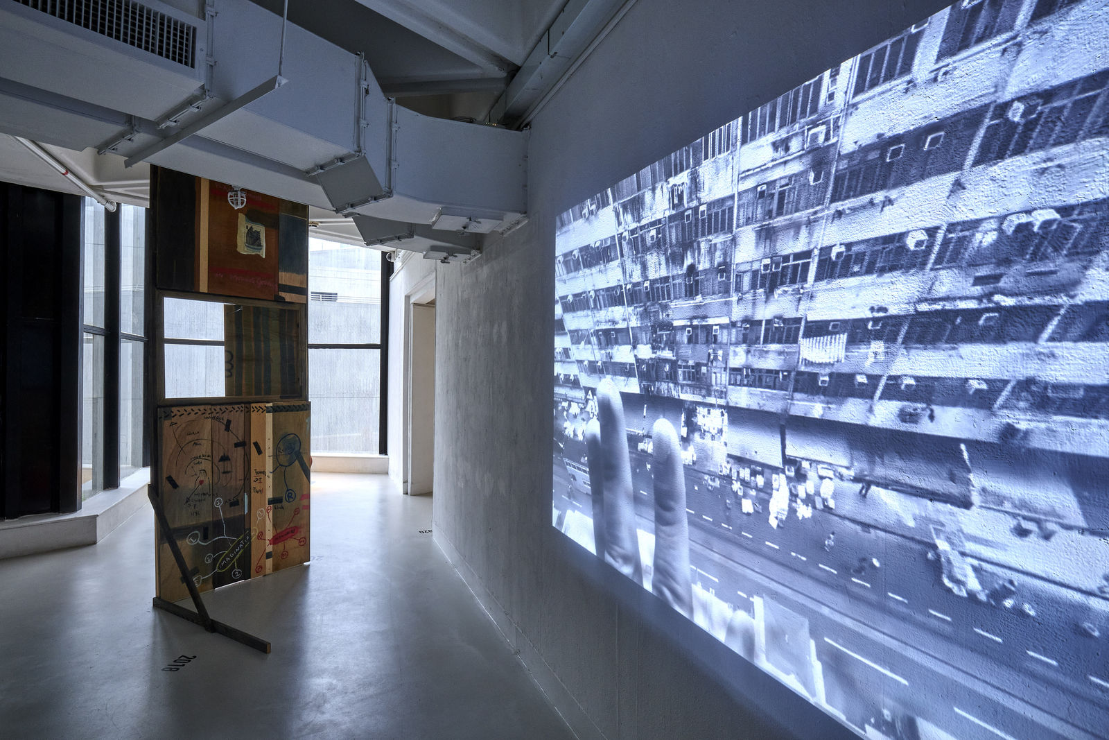 The Present is a Foreign Country (2022) Installation: Single-Channel Video, Acrylics & Charcoal Painting on Plywood, Dimension Variable