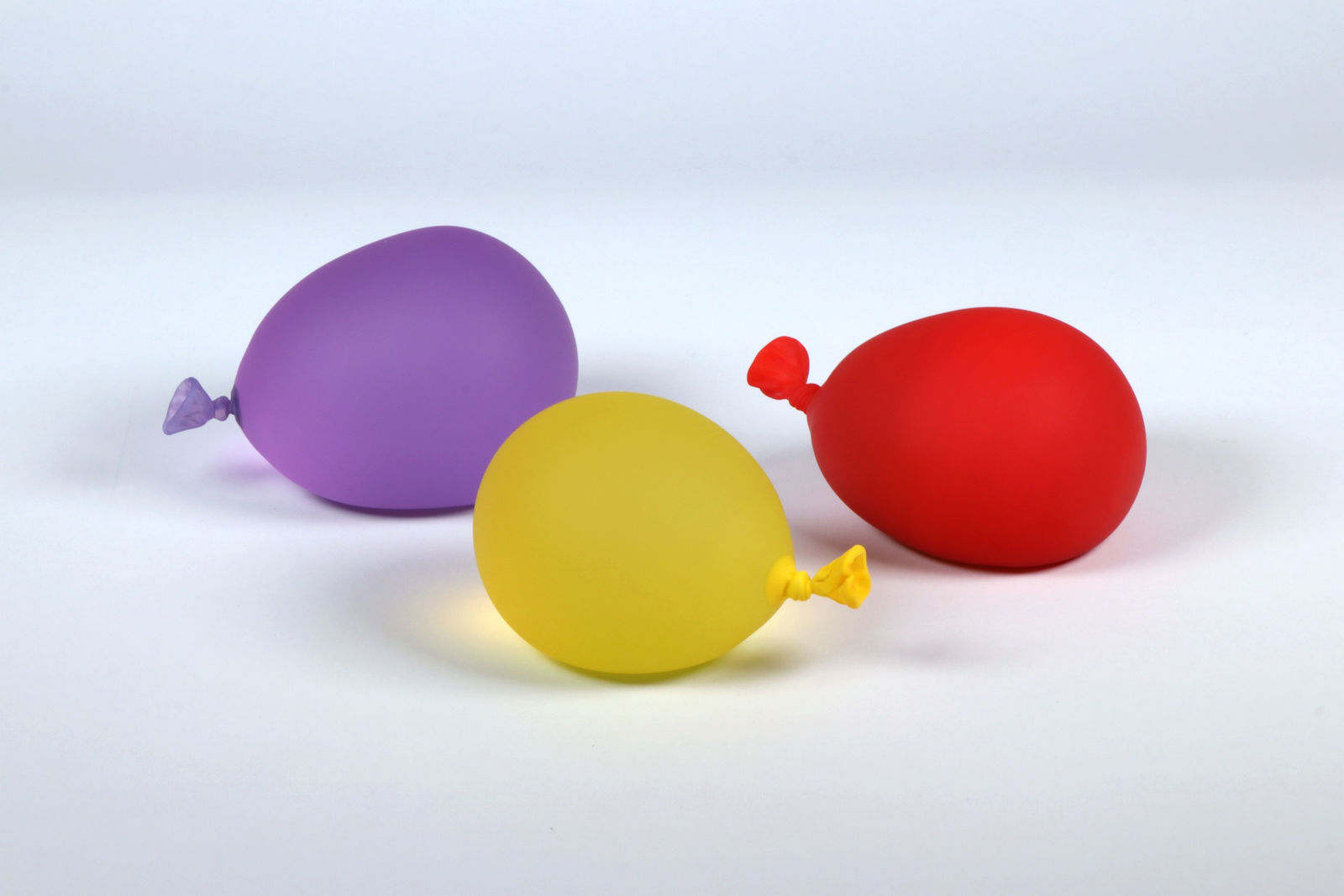 Dylan Martinez Water Balloons Portfolio VIII, 2024 Set of 3 glass sculptures - hot sculpted, sandblasted, acid etched Yellow: 4 x 3 x 2.75 Inches Purple: 4.25 x 3 x 3 Inches Red: 4.25 x 3 x 2.5 Inches Unique Variations