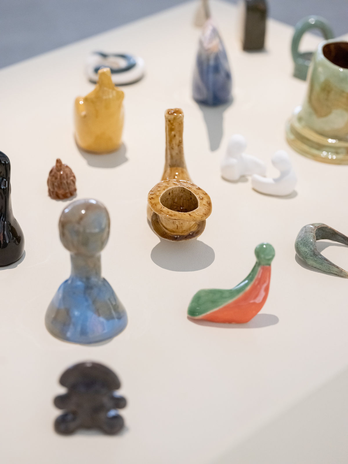 Rand Abdul Jabbar, Earthly Wonders, Celestial Beings, 2019-ongoing Glazed stoneware, dimensions variable (Installation view, Louvre Abu Dhabi, 2022). Courtesy of the Artist.