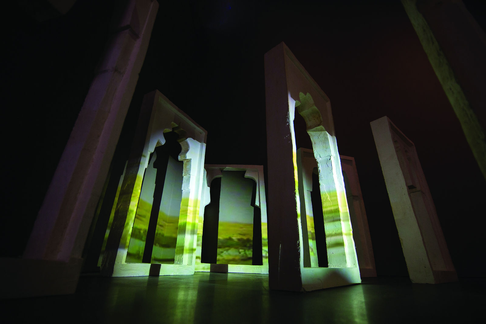 Rand Abdul Jabbar, ...and the river washing its feet, 2019 Gypsum casts of Anah minaret moulds, video projections, sound. Courtesy of the artist.