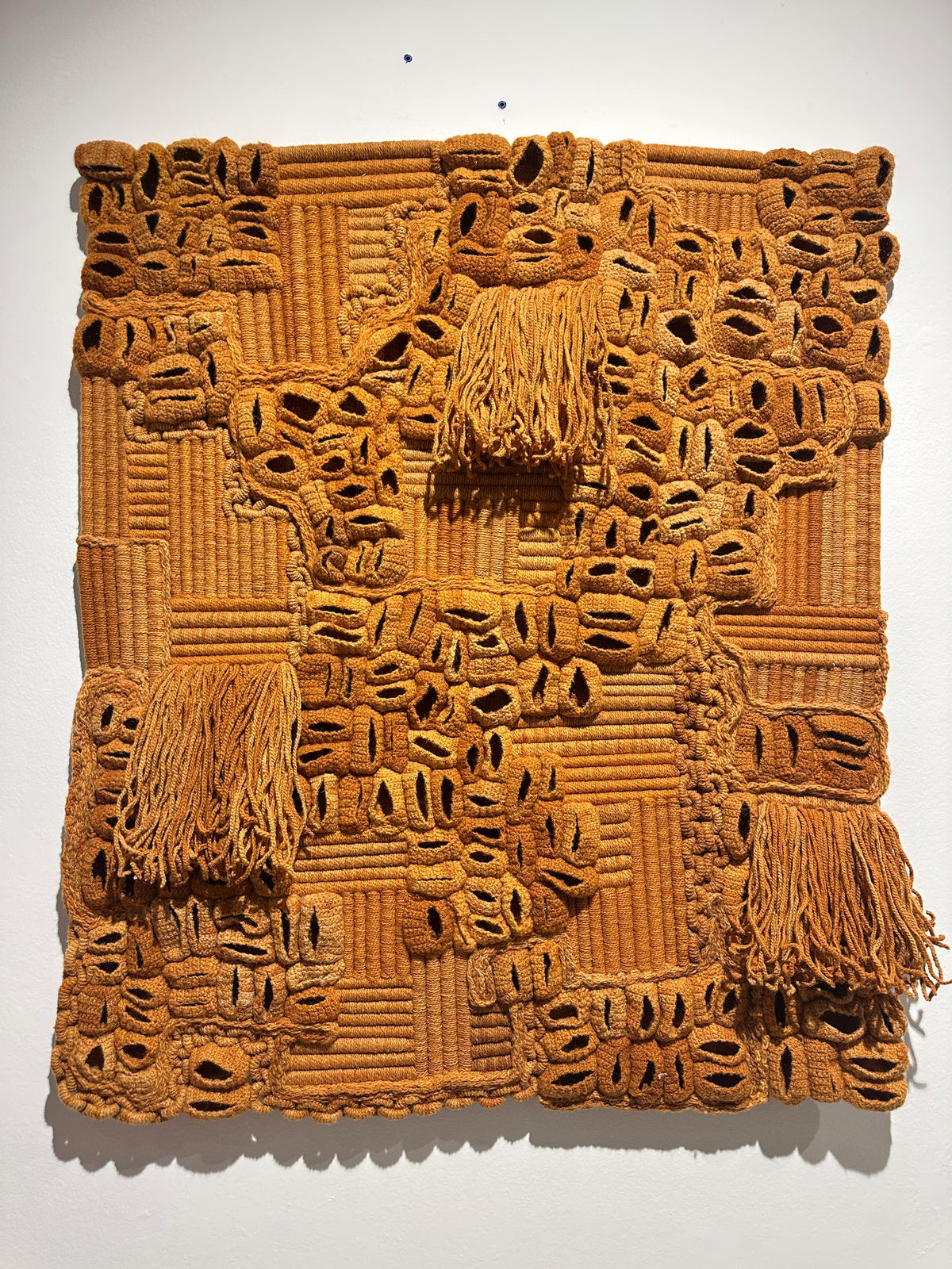 Amina Agueznay,Talisman of henna- Variation #9 (2025) Natural wool dyed with cotton thread and steel structure 120 x 100 cm