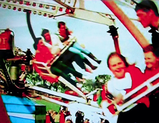 Kids in an amusement park ride