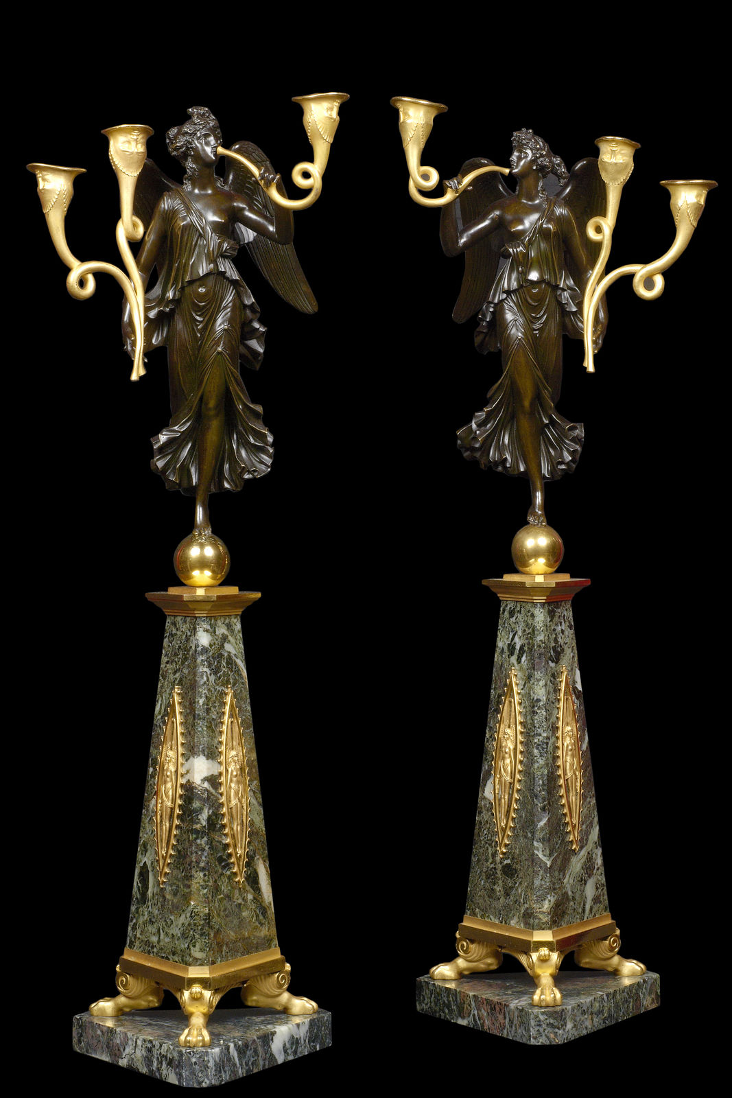 Pierre-Philippe Thomire (attributed to), A pair of Empire three-light candelabra attributed to Pierre-Philippe Thomire after a design by Pierre-Louis-Arnulphe Duguers de Montrosier, Paris, date circa 1805