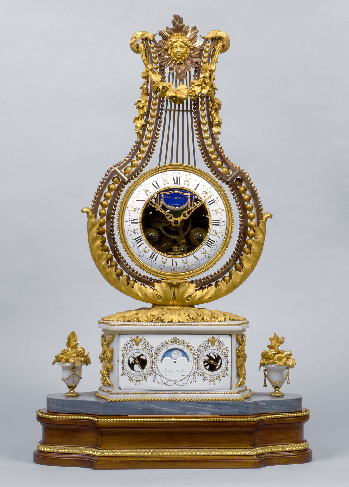 Joseph Coteau, A Louis XVI lyre clock by Jacques-Thomas Bréant, enamel work by Joseph Coteau, Paris date 1775-80