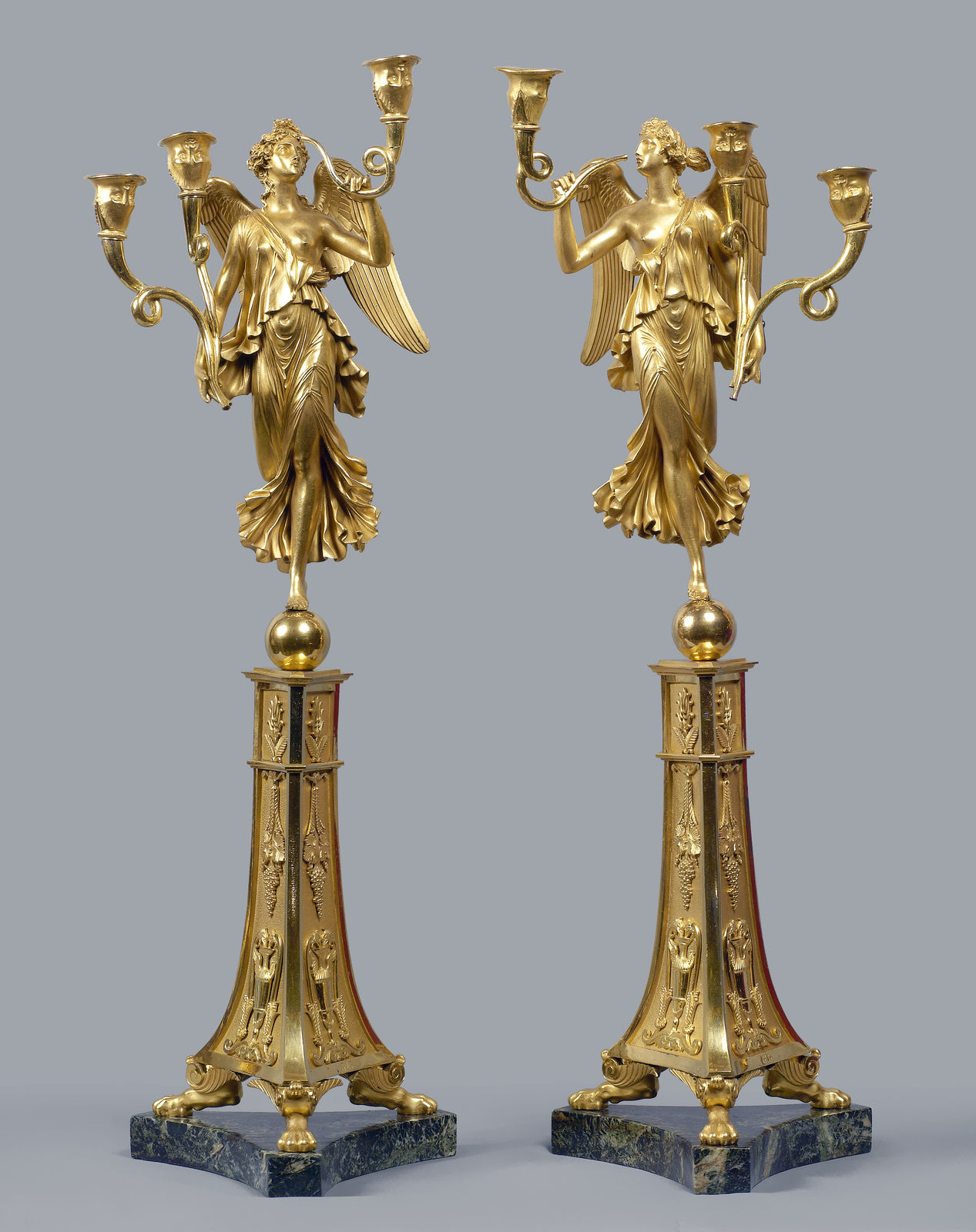 Pierre-Philippe Thomire (attributed to), A pair of Empire three-light candelabra attributed to Pierre-Philippe Thomire after a design by Pierre-Louis-Arnulphe Duguers de Montrosier, Paris, date circa 1805