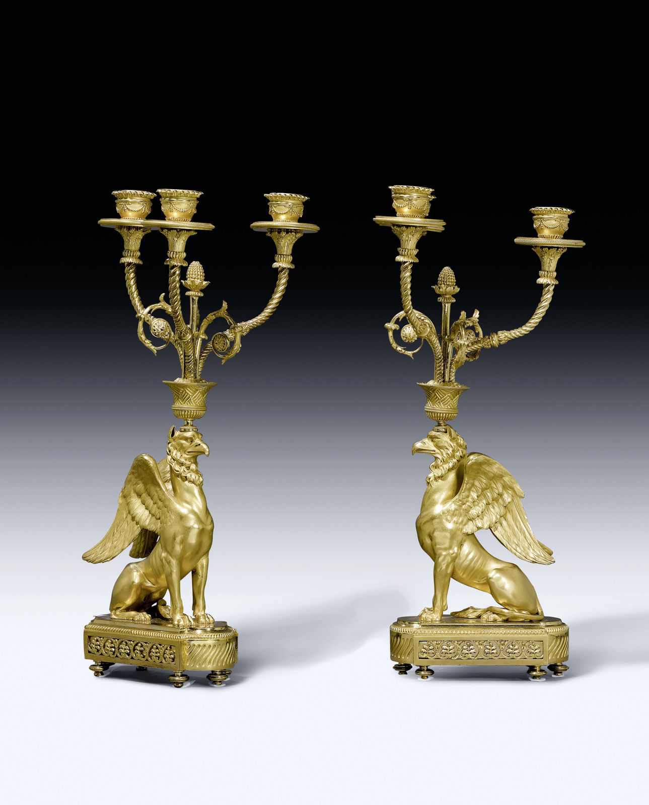 François Rémond (attributed to), A pair of Empire three-light candelabra, known as ‘candélabres au griffon’ attributed to François Rémond, Paris, date circa 1805