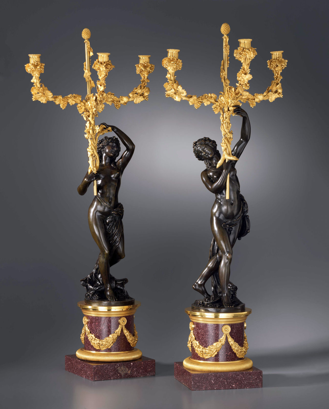 Unknown, A pair of Louis XVI three-light figural candelabra after a model attributed to Clodion, Paris, date circa 1780-85