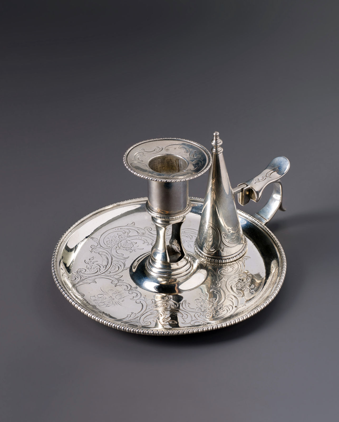 A silver candle holder