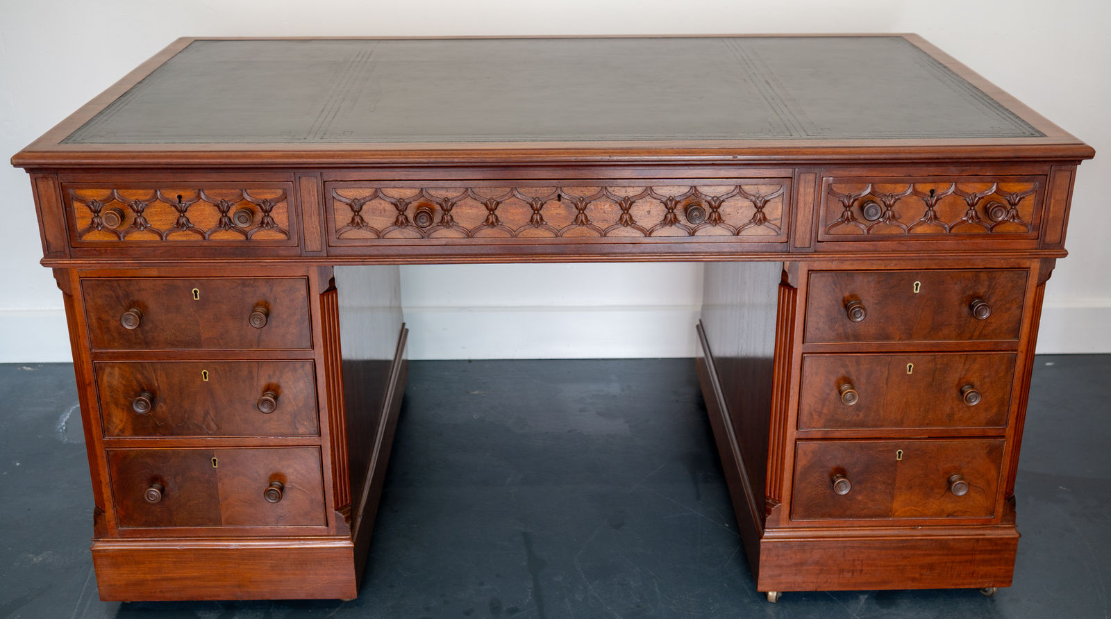attributed to Wright and Mansfield of London, A VICTORIAN MAHOGANY CHIPPENDALE-STYLE PEDESTAL DESK , London, date circa 1875