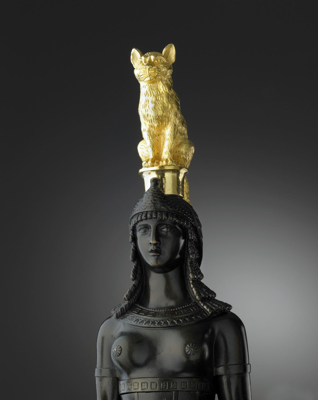 Pierre-Philippe Thomire (attributed to), A pair of Empire two-light candelabra retour d’Egypte attributed to Pierre-Philippe Thomire after a design by Charles Percier, Paris, date circa 1810