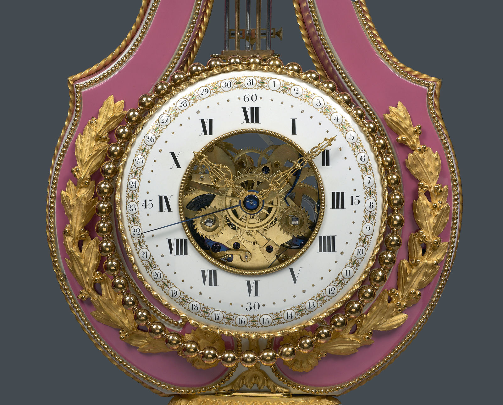 Joseph Coteau, A Louis XVI skeletonised lyre clock, enamel work by Joseph Coteau and movement attributed to Dieudonné Kinable, Paris, date circa 1795-97