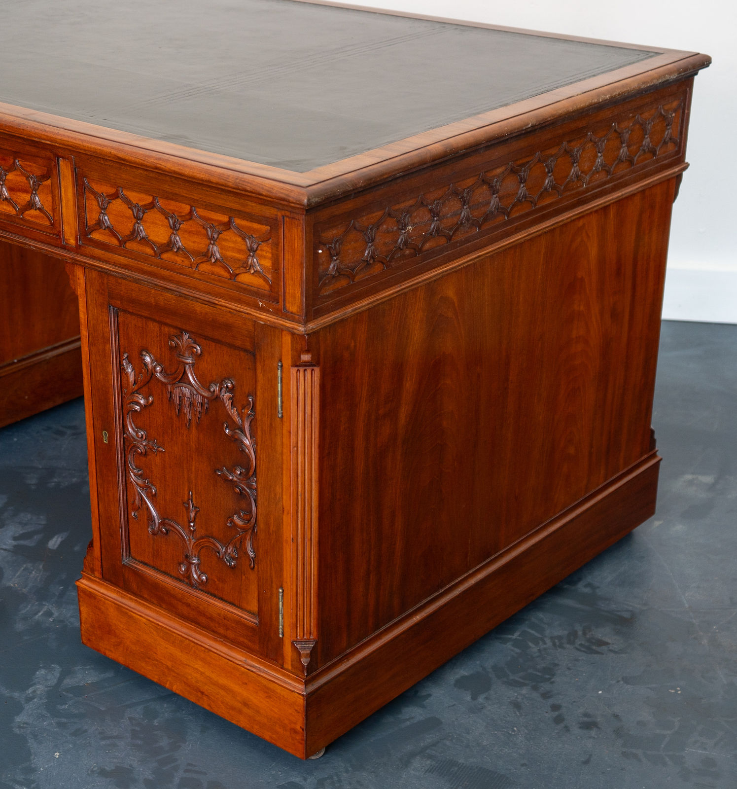 attributed to Wright and Mansfield of London, A VICTORIAN MAHOGANY CHIPPENDALE-STYLE PEDESTAL DESK , London, date circa 1875