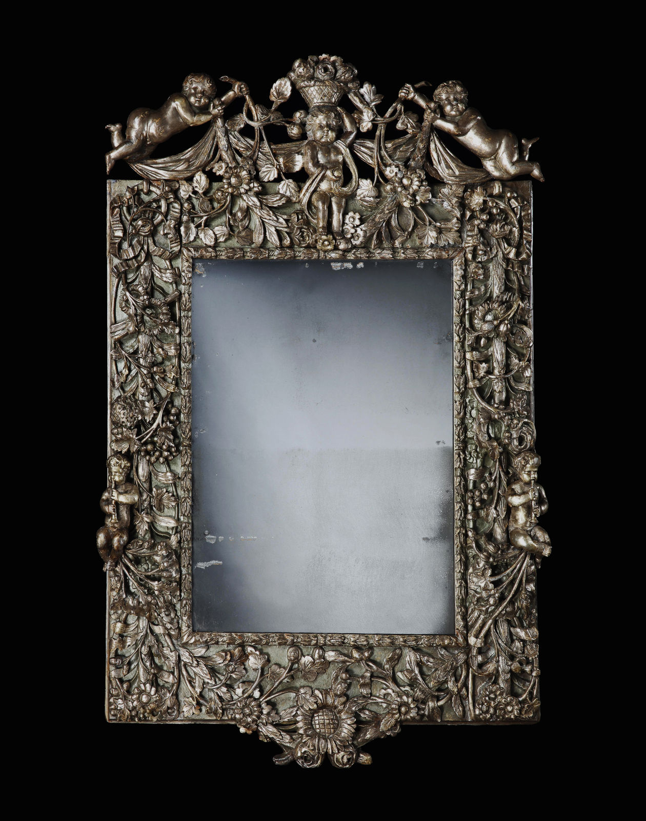 A HIGHLY IMPORTANT CHARLES II CARVED AND SILVERED MIRROR, ENGLISH, CIRCA 1685