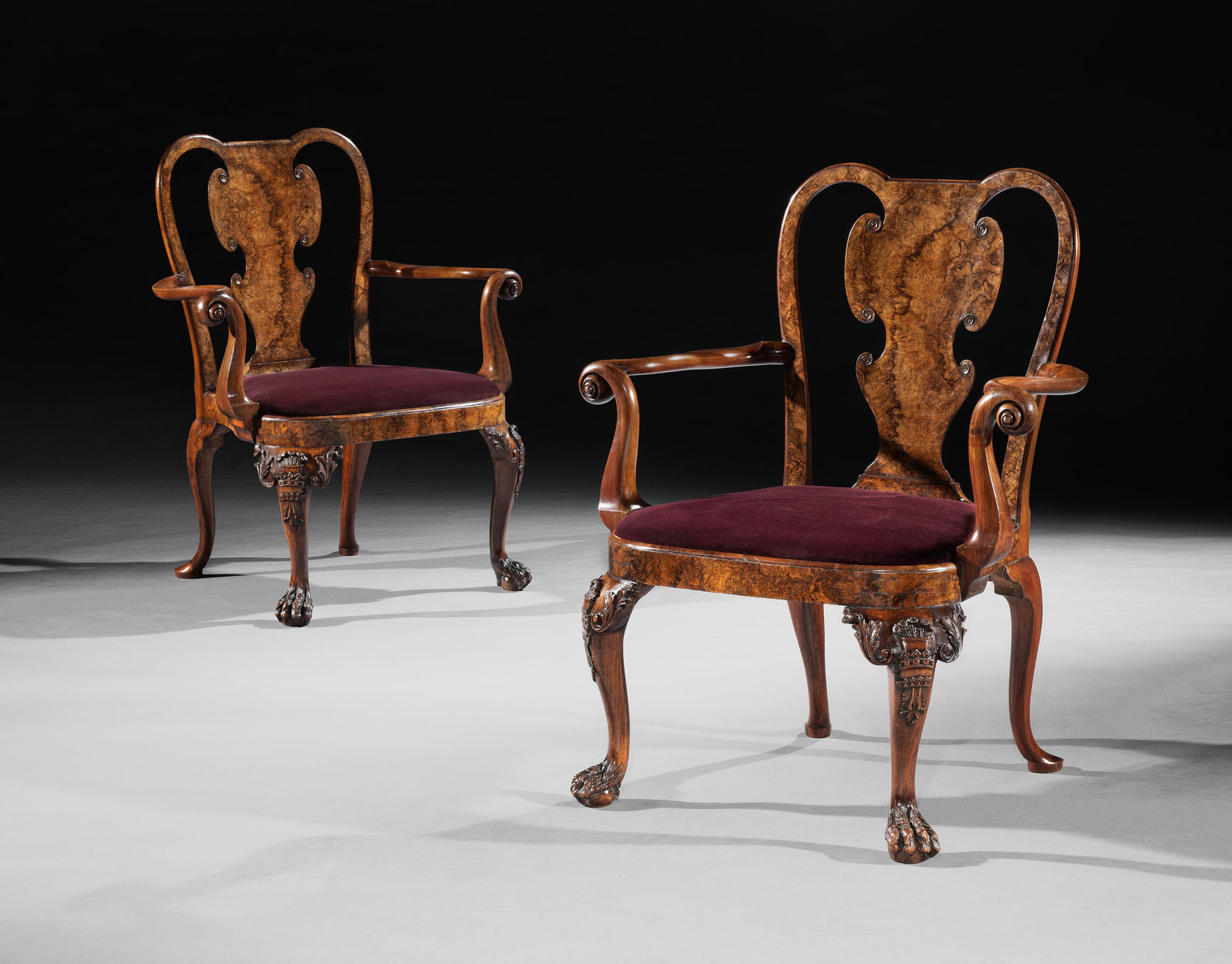 A PAIR OF GEORGE II WALNUT AND BURR WALNUT ARMCHAIRS, ENGLISH, CIRCA 1735