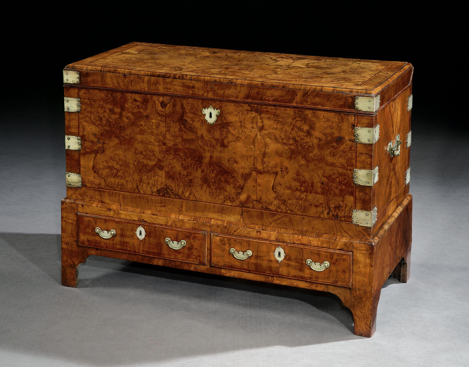 A GEORGE I WALNUT AND BURR WALNUT COFFER-ON-STAND, ENGLISH, CIRCA 1720