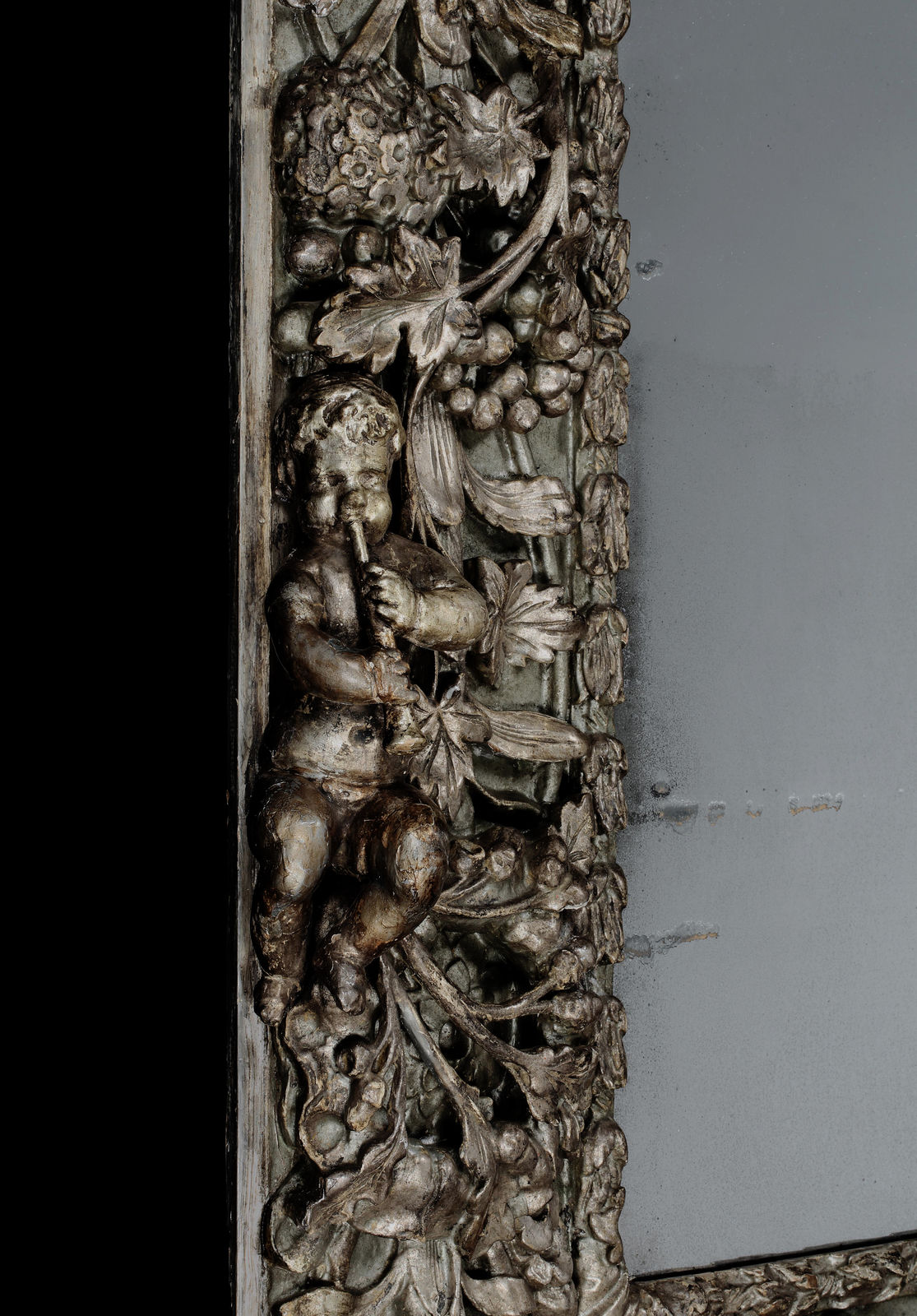 A HIGHLY IMPORTANT CHARLES II CARVED AND SILVERED MIRROR, ENGLISH, CIRCA 1685