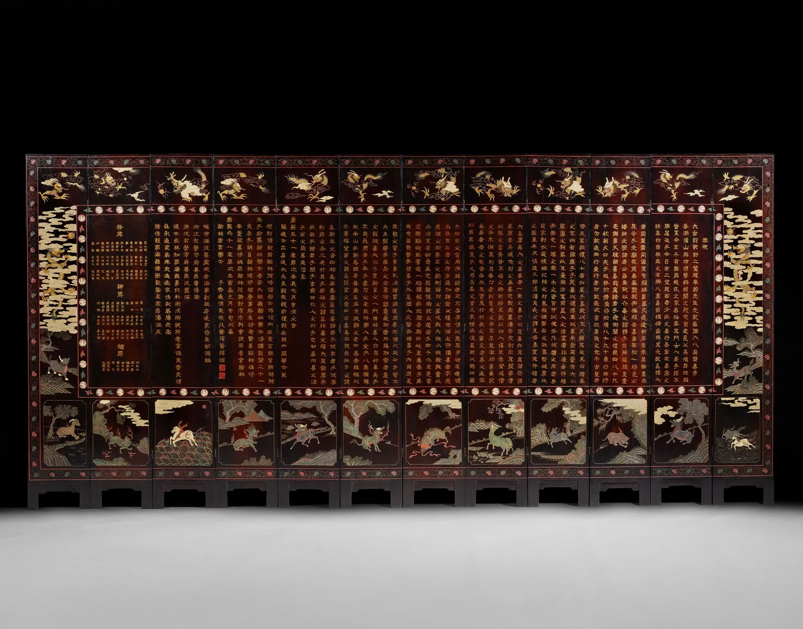 A Magnificent Twelve-Panel Coromandel Lacquer Screen Depicting Guo Ziyi, Kangxi Period, dated 1722