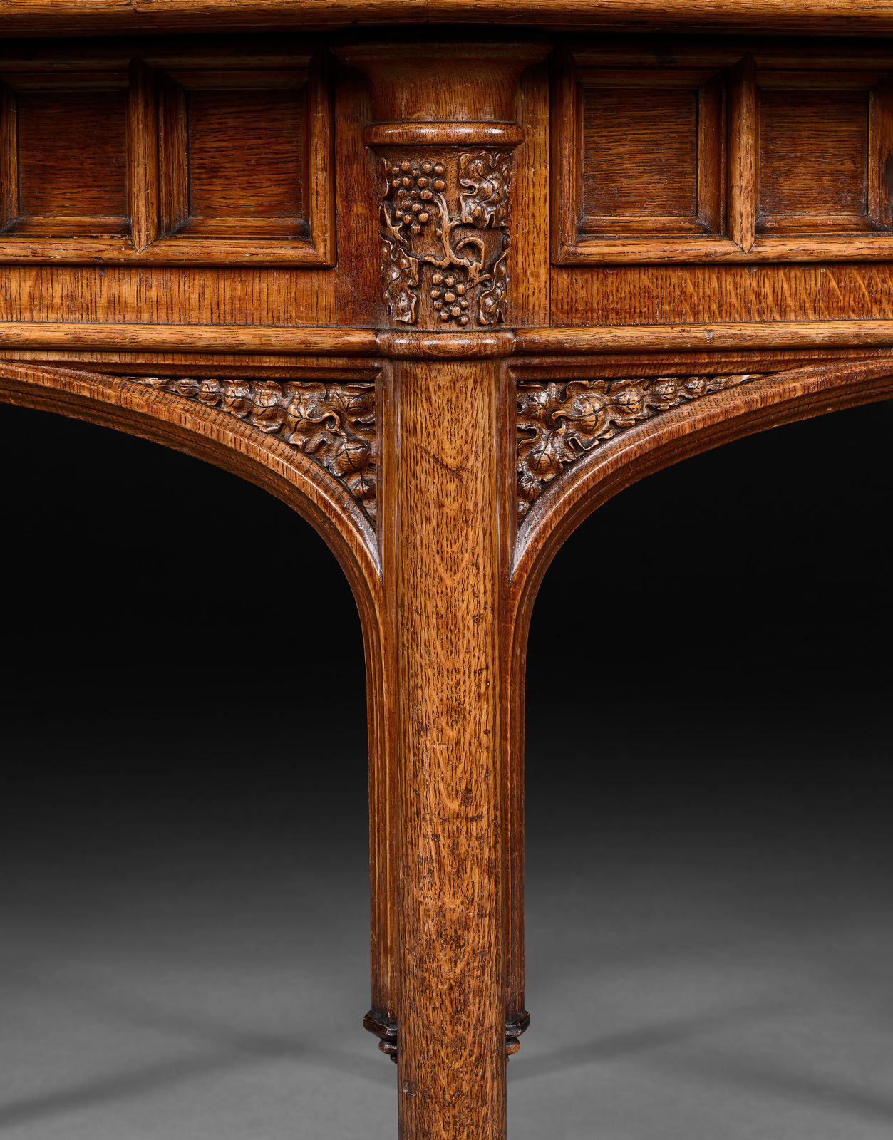 The Bridehead Library Table: A William IV Gothic revival Oak Library table, English, circa 1830