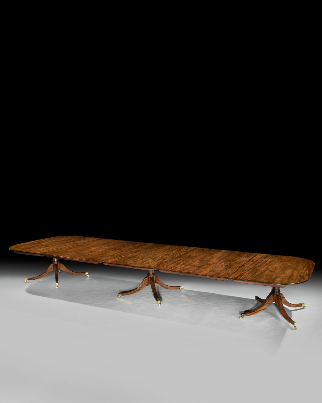 A GEORGE III MAHOGANY PEDESTAL DINING TABLE, English, circa 1790