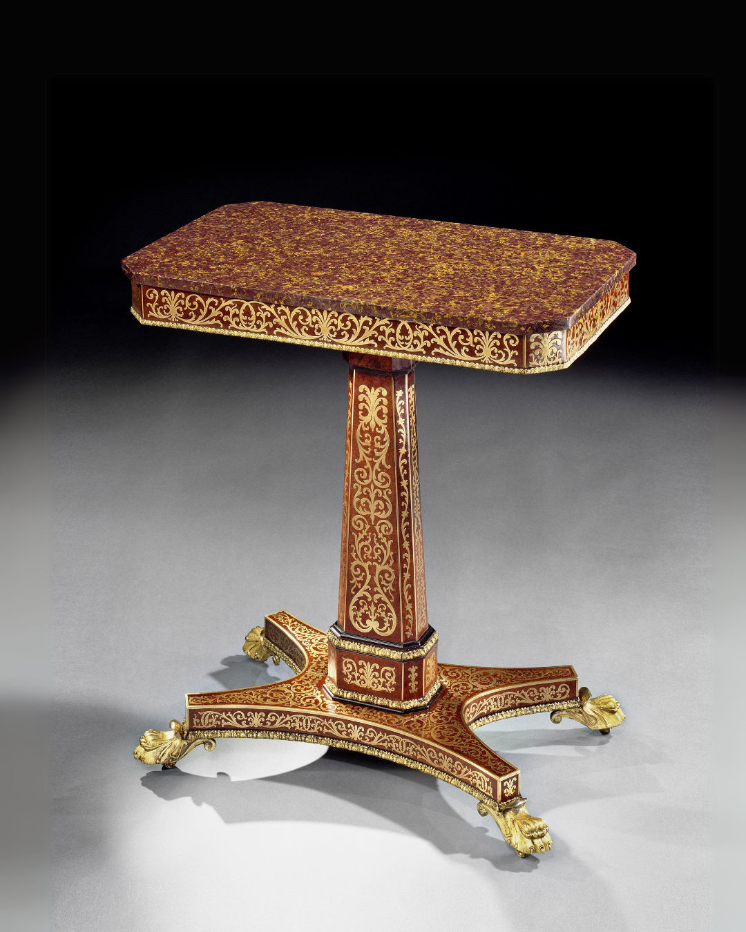 A REGENCY AMBOYNA BRASS INLAID CENTRE TABLE, English, circa 1815