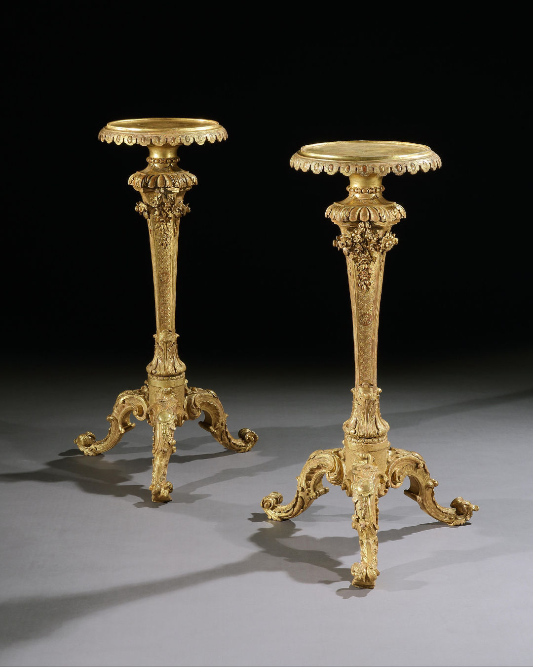 A PAIR OF GEORGE II GILTWOOD TORCHÈRES, English, circa 1745