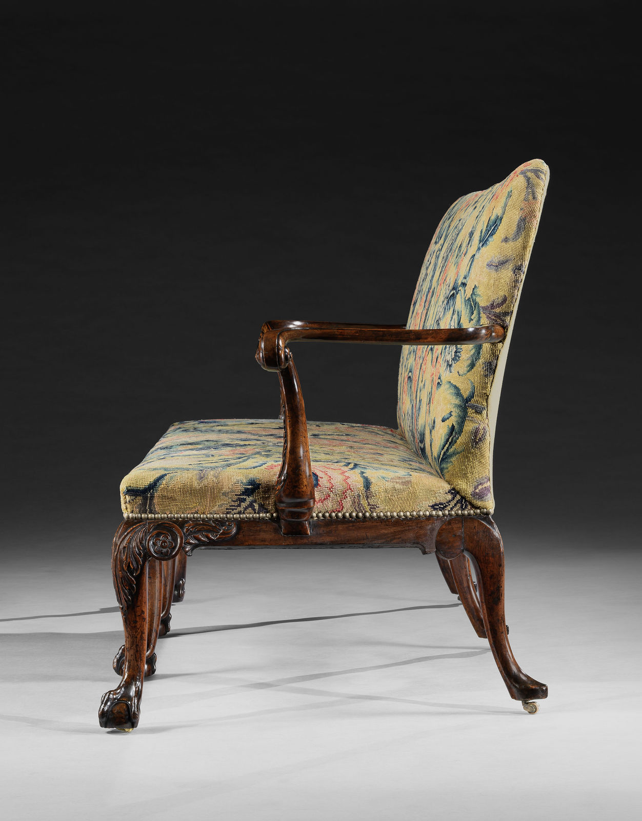 THE PERCIVAL GRIFFITHS RAMSBURY MANOR SETTEE, The settee: English, circa 1750  The associated needlework cover: English, circa 1750