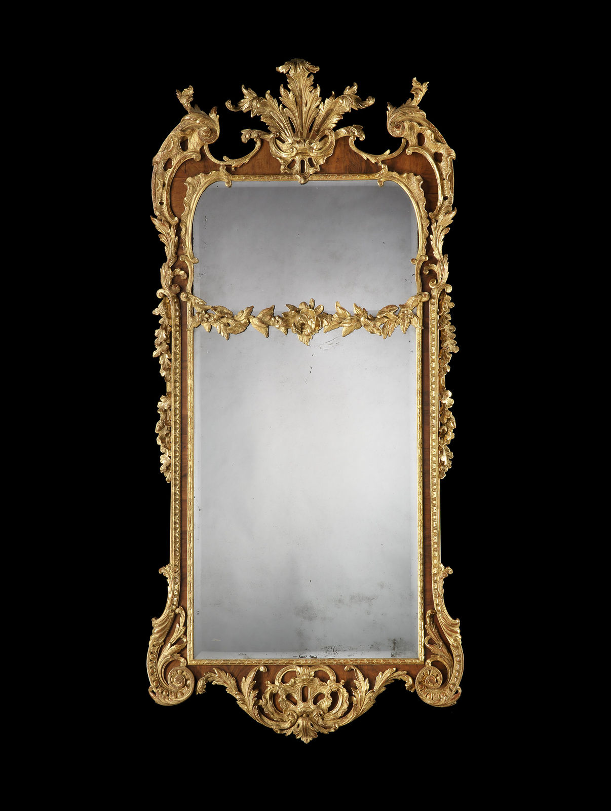 A PAIR OF GEORGE II PARCEL GILT WALNUT PIER MIRRORS, English, circa 1730