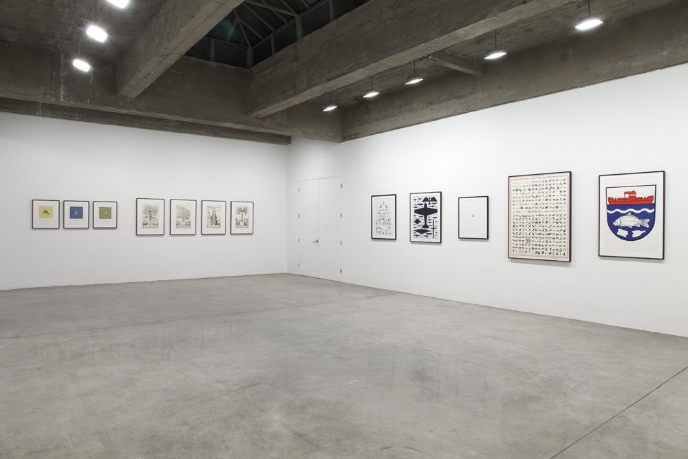 installation view of framed drawings
