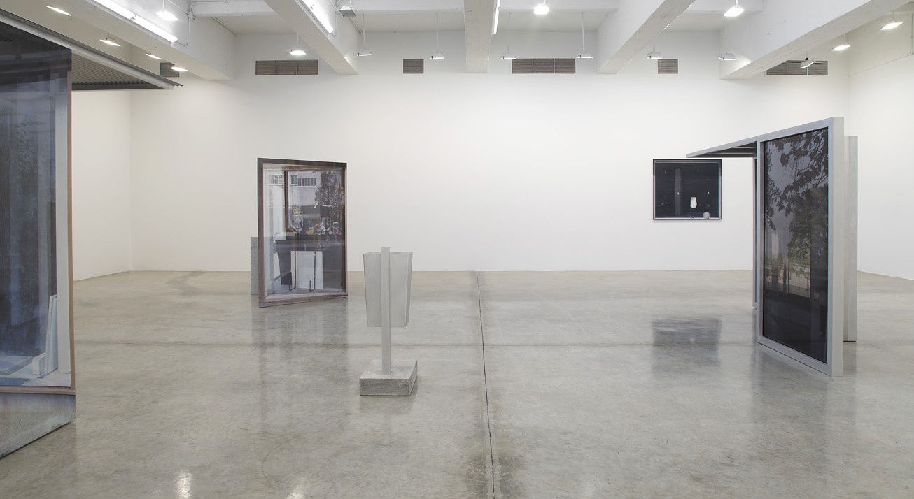 image of Hornig sculptures with transparent photographs