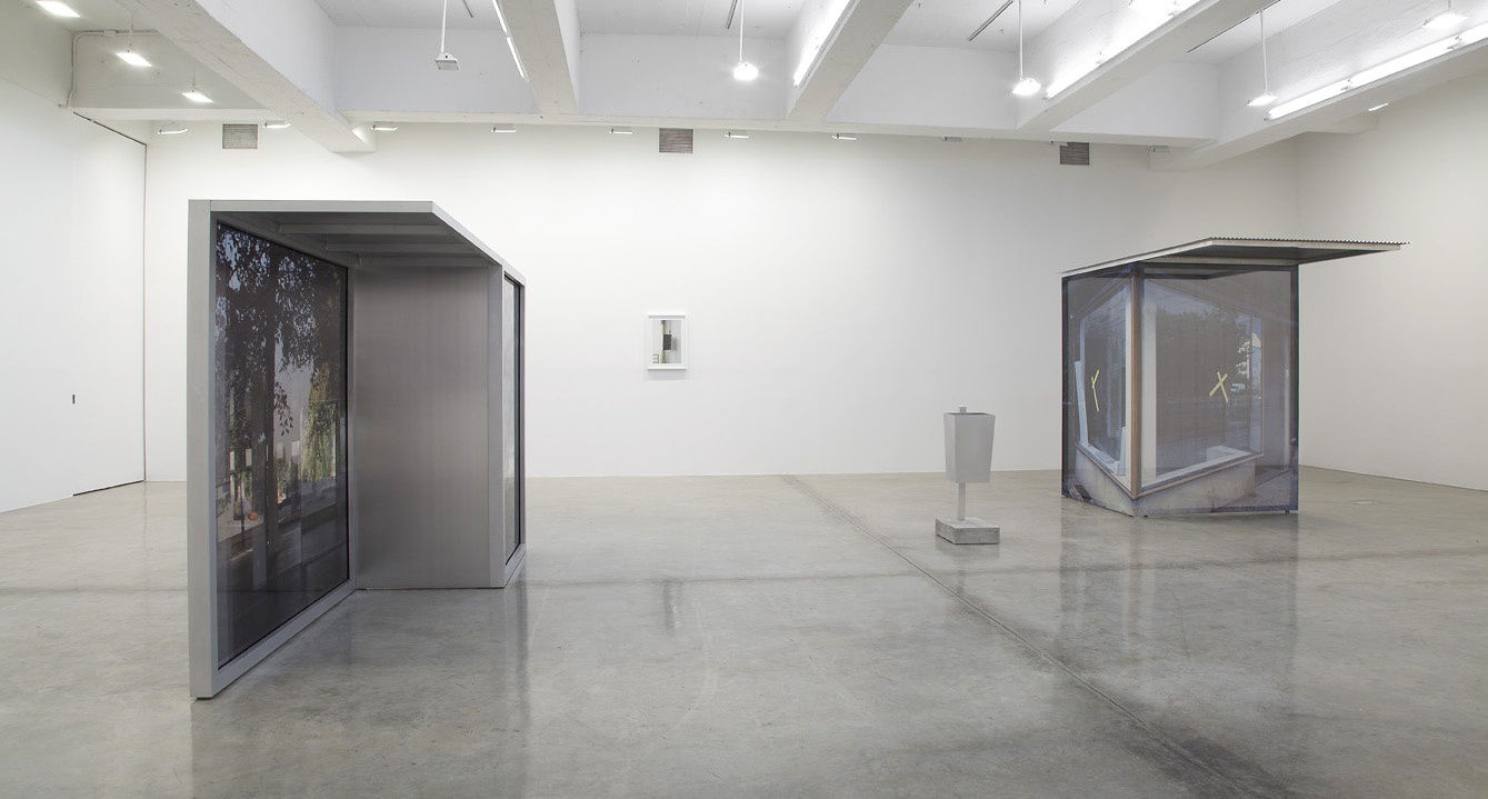 image of Hornig sculptures with transparent photographs