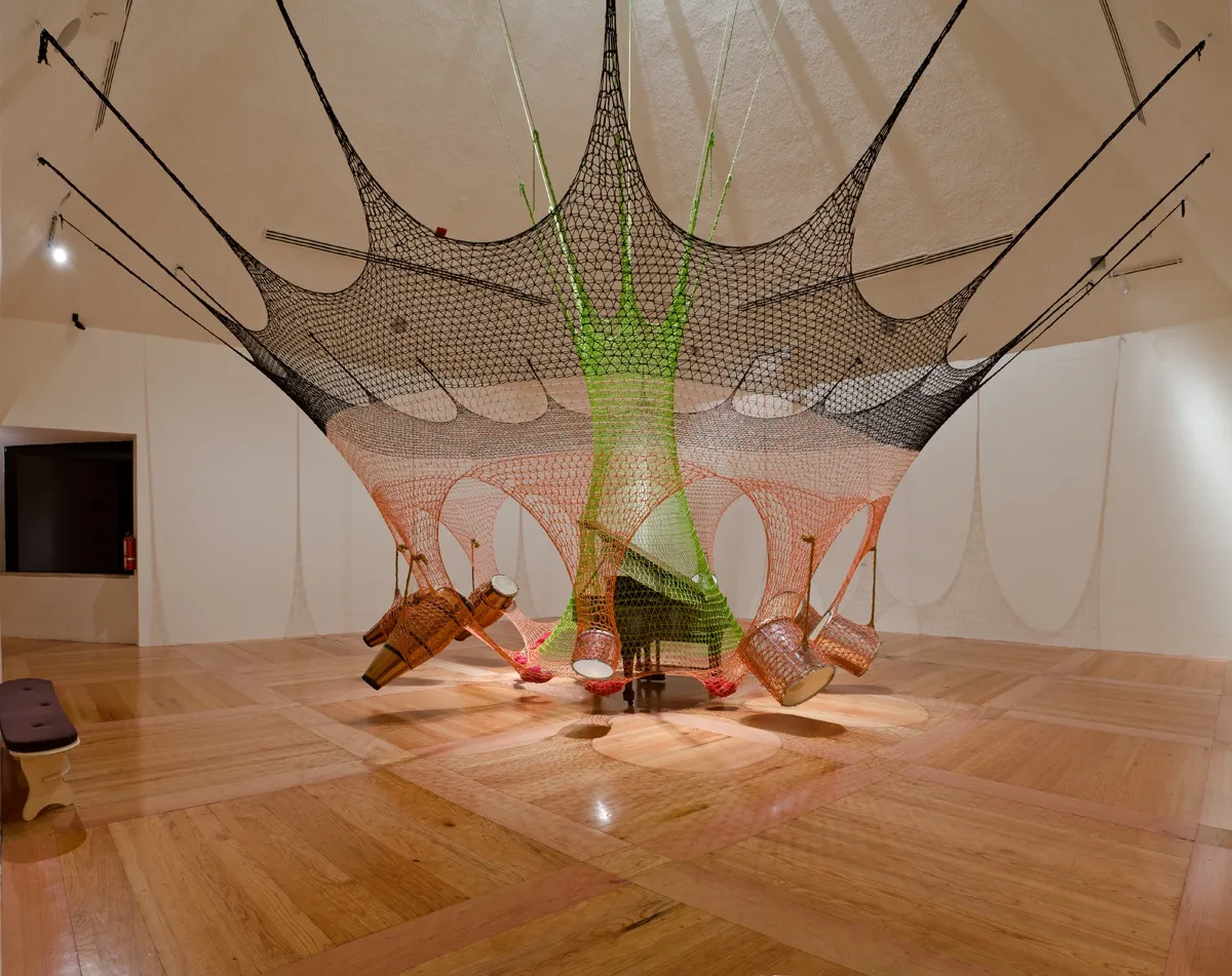 Crochet ceiling installation with instruments