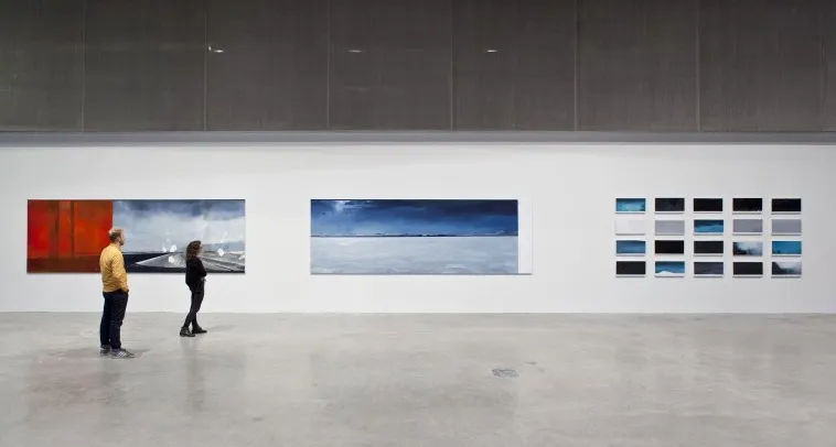 Installation view of 3 Carla Klein paintings