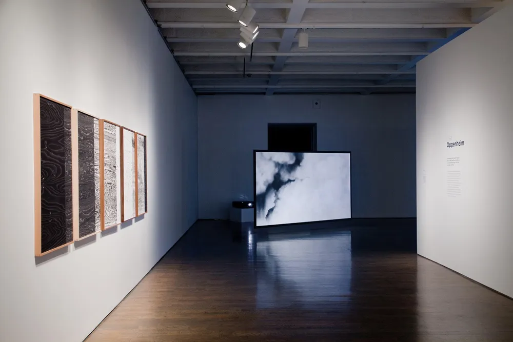 Installation view of Lisa Oppenheim exhibition, cloud projections
