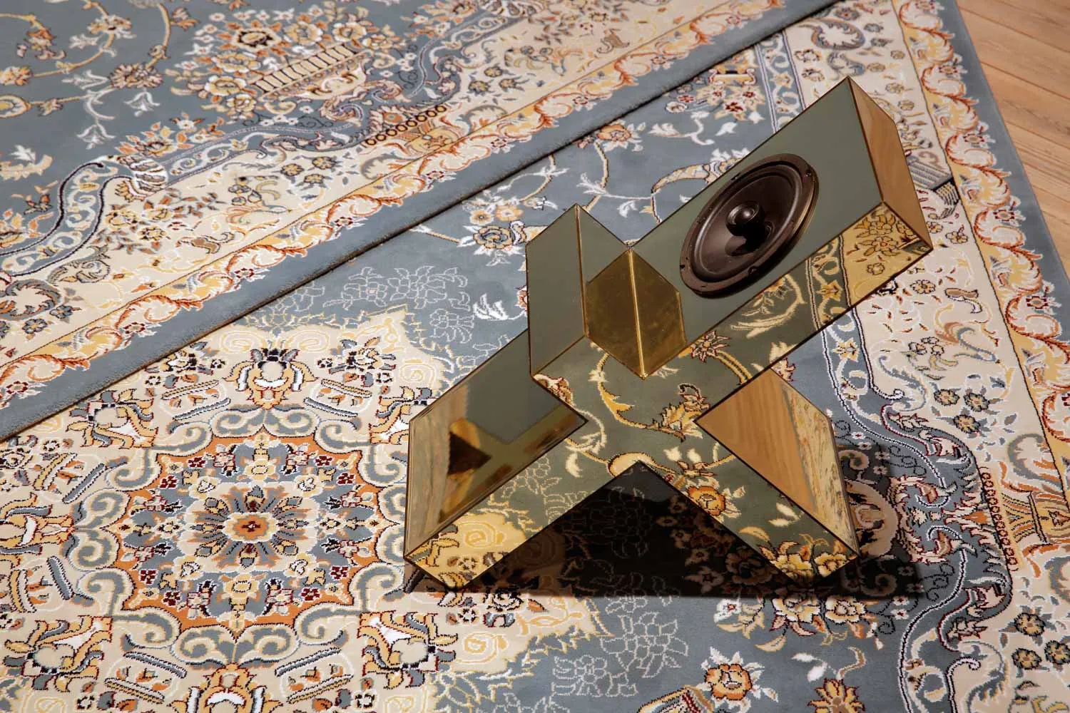 Image of an installation view of Slavs and Tatars - carpet and sculpture