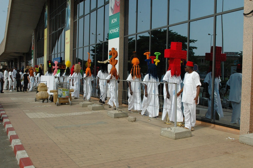 image of processional with people wearing large wigs