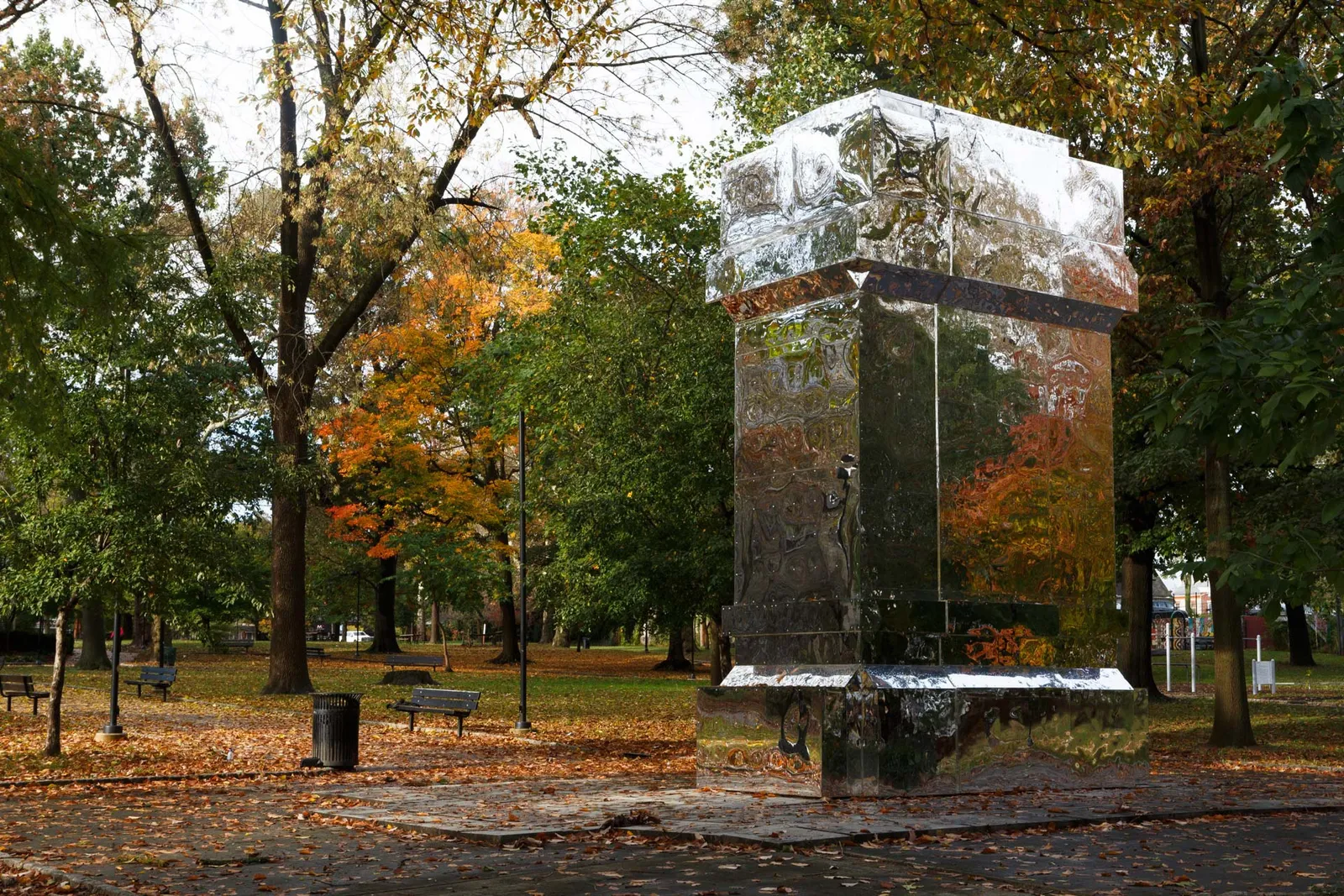 image of reflective panels structure covering monument