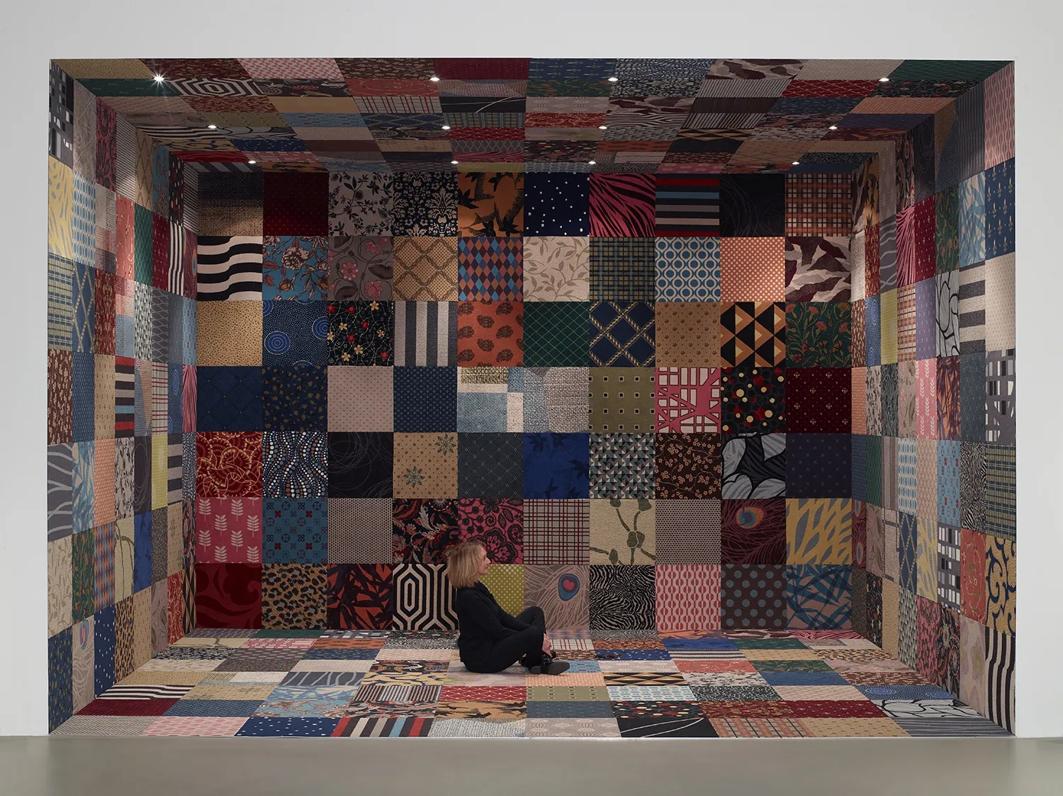 image of carpeted room with text