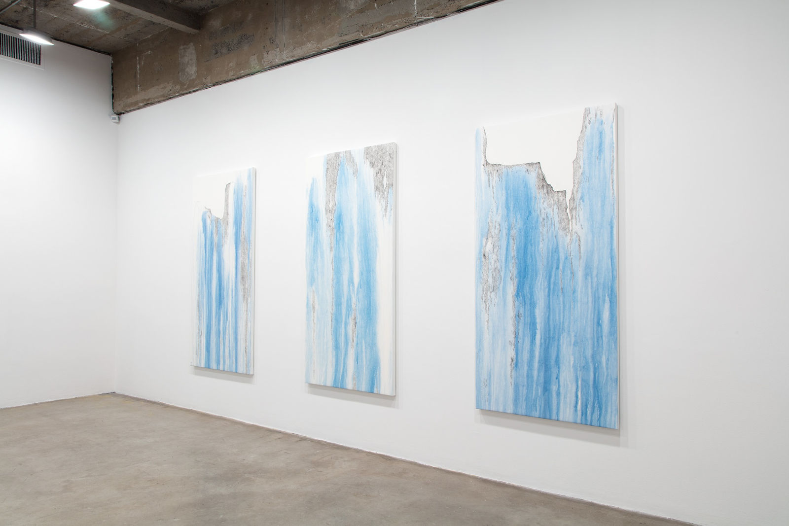 Cinto install with 3 paintings