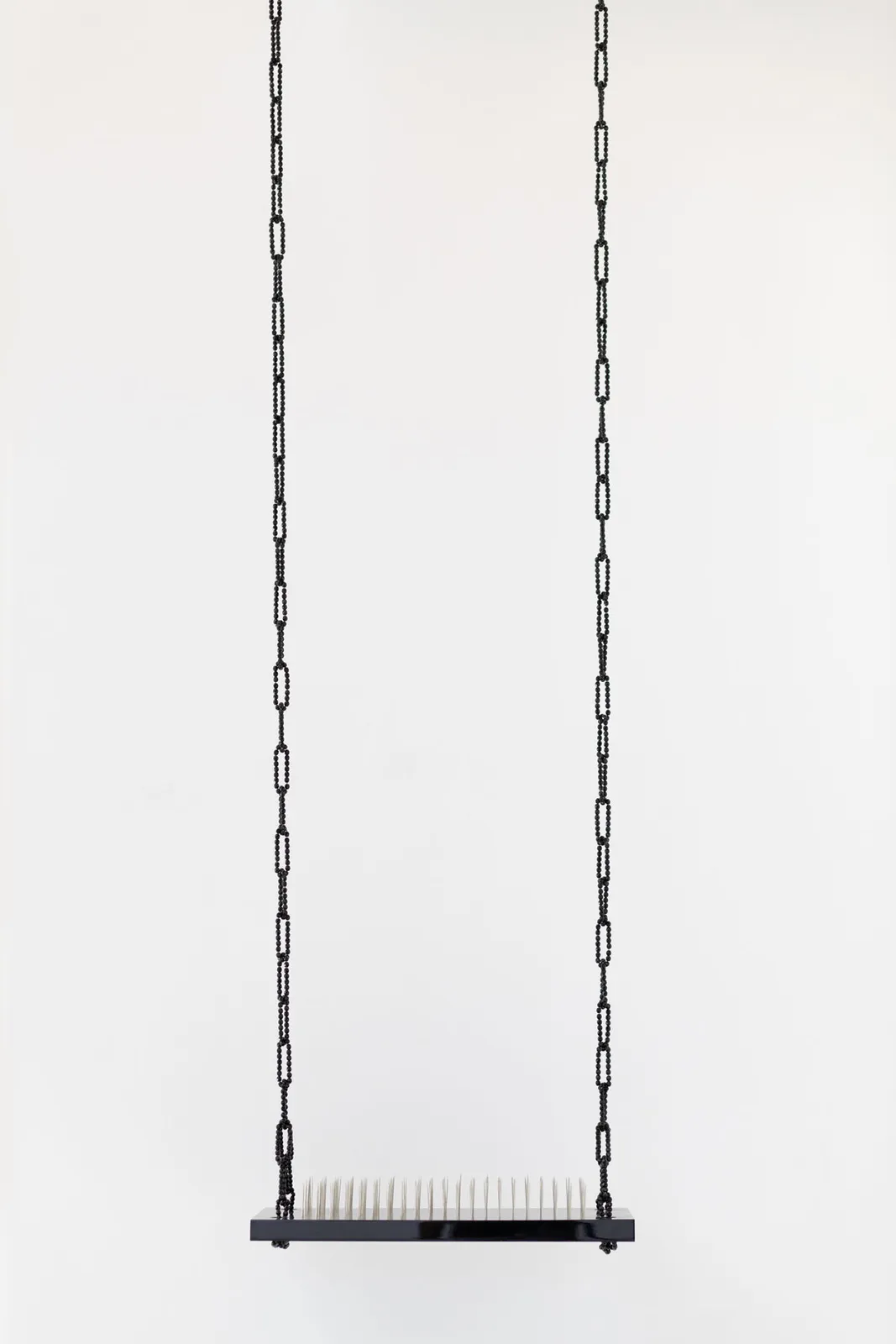 Nazareth Pacheco, Sem título (da série objetos de perfuração balanço aço e pregos)