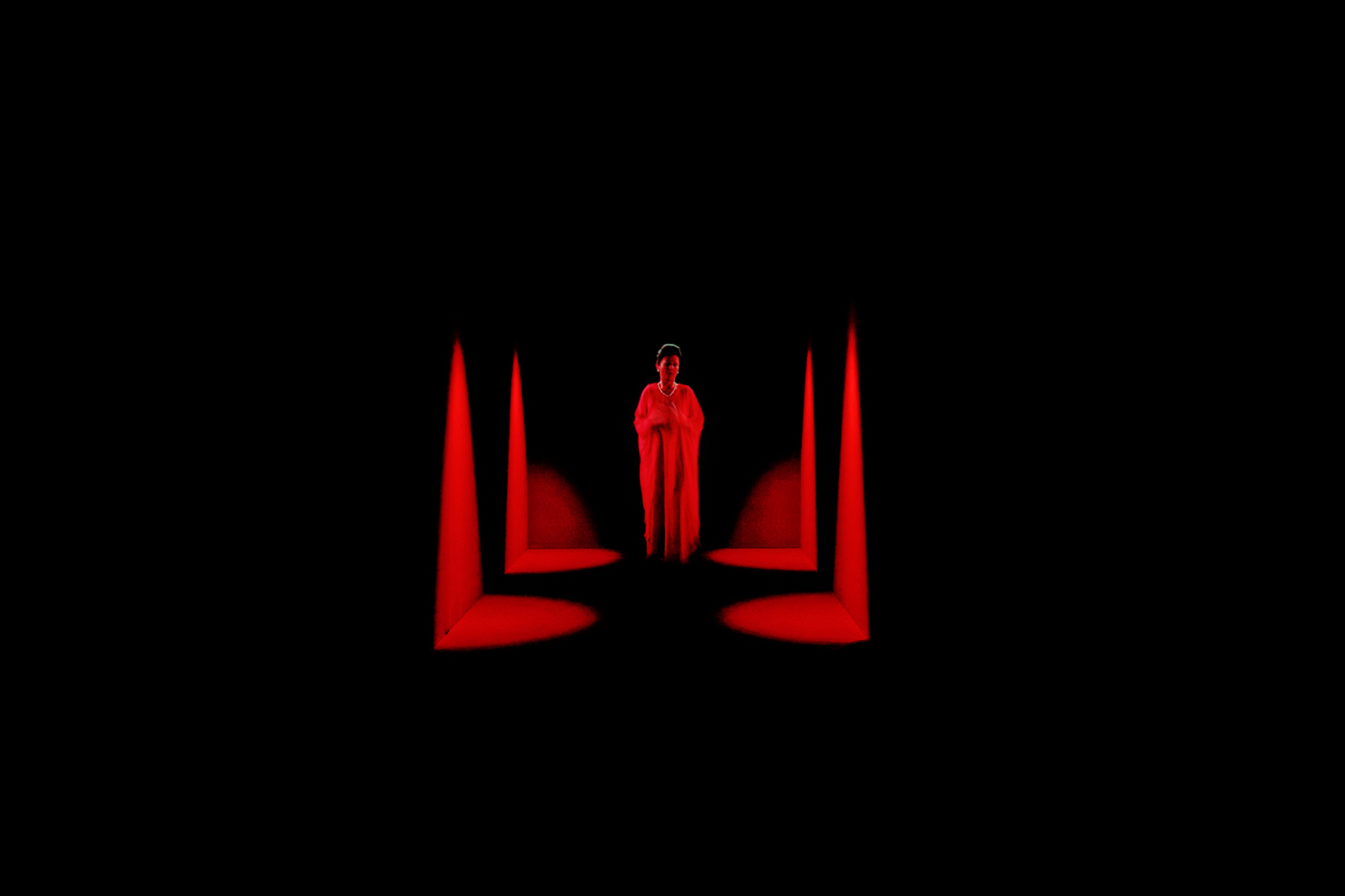 <div class="image_caption_container"><div class="image_caption"><p><span class="s1">Dominique Gonzalez-Foerster, </span><span class="s1"><strong>OPERA (QM.15)</strong>, 2016, </span><span class="s1">HD video, projector, screens, media player, amplifier, speakers, lights, curtains, minimum screening surface 1500 width × 750 cm depth, duration: 8 min 05 sec. </span><span class="s1">© Dominique Gonzalez-Foerster / ADAGP, Paris 2022 / Pinault Collection.</span></p><p><span class="s1"> Photo: Aurélien Mole. Courtesy Pinault Collection</span></p></div></div>