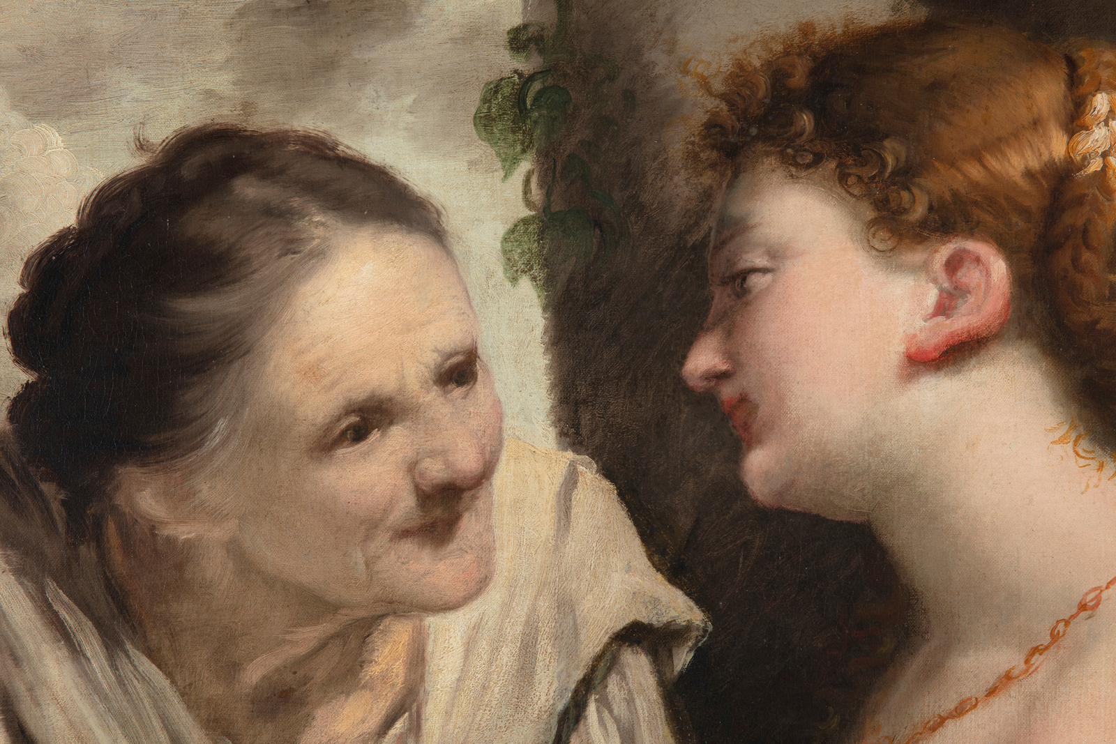 Detail of an oil painting shows an older and younger woman in conversation. The image illustrates an old fable using summer as a metaphor for beauty. Summer draws closer to its end, and beauty, along with life, is fleeting. This detail shows the faces of the two characters.