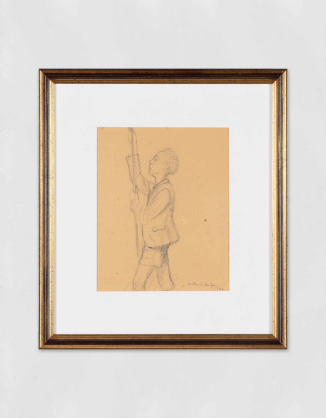 A pencil drawing on paper of a young man pulling rope.